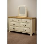 Oak and cream finish seven drawer chest (W135cm, H79cm, D43cm),