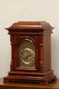 Edwardian walnut mantle clock, arched door with bevelled glass,