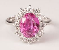 Pink sapphire and diamond white gold cluster ring hallmarked 18ct (sapphire approx 2.