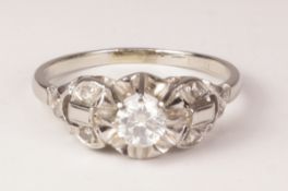 Brilliant cut diamond ring with diamond shoulders stamped plat Condition Report