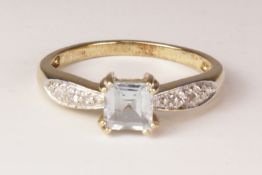 Gold princess cut aquamarine ring with diamond shoulders hallmarked 9ct Condition Report