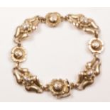 Georg Jensen rose gold-plated silver bracelet the links in the form of stylised flowers,