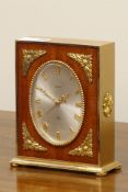 Late 20th century 'Swiza' gilt metal and walnut mantel clock, 7 jewel movement, oval shaped dial,