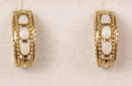 Pair of fancy half hoop gold ear-rings each set with three opals hallmarked 9ct Condition