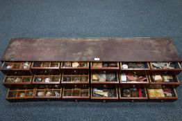 Mahogany specimen chest containing range of pocket watch glasses,
