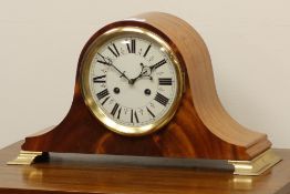 Late 20th century figured mahogany dome top mantel clock, brass finish bracket feet,