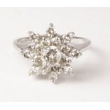 Diamond snowflake cluster white gold ring stamped 14KP Condition Report <a
