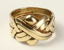 Gold interlocking love knot ring hallmarked 9ct approx 12.