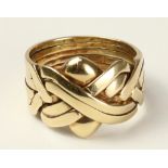 Gold interlocking love knot ring hallmarked 9ct approx 12.