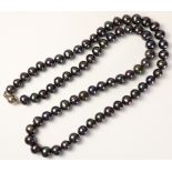 Single string grey pearls the clasp stamped 925 approx 55cm Condition Report <a