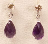 Pair amethyst and diamond white gold ear-rings hallmarked 9ct (diamonds approx 0.