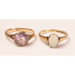 Rose gold ring set with an amethyst stamped 9ct and an opal ring hallmarked 9ct Condition