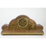Late 19th century large brass mantel clock, shaped top, with tooled copper scroll work, W69cm,
