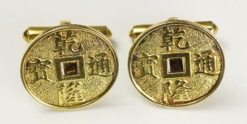 Pair circular gold cuff-links, raised Chinese symbols stamped 14k approx 8.