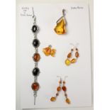 Baltic amber pendants and pairs ear-rings and a Whitby Jet and Baltic amber bracelet stamped 925