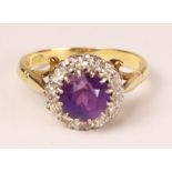 Amethyst and diamond cluster ring hallmarked 18ct Condition Report <a