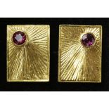 Pair of ruby set gold cuff-links tested to 18ct approx 10.