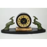 Art Deco period marble and slate mantel clock, circular dial, two leaping gazelle figures,