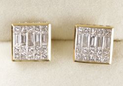 Pair of square set diamond and baguette diamond ear-rings hallmarked 18ct Condition