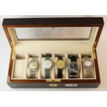 Collection of wristwatches in watch case Condition Report <a href='//www.