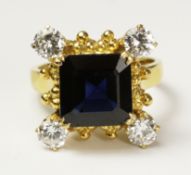 Square set sapphire and four diamond ring tested to 18ct approx 6.