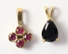 Ruby pendant hallmarked 9ct and a sapphire pendant Condition Report <a