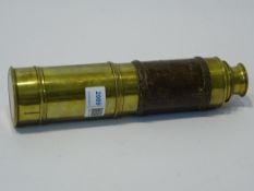 Early 20th century brass & leather three draw telescope, with end cap, L74cm max.