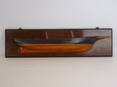19th century ship's pine and black painted half block model of a twin masted ship,