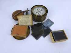 Early 20th century brass drum cased travel Compass with card dial in gimbal case with lid, 9.