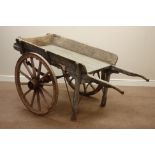 Early 20th century wooden hand cart, iron bound spoked wheel with cart spring suspension,
