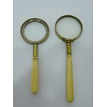 Two late 19th century brass magnifying glasses with tuned bone handles, L11.5cm max (2).