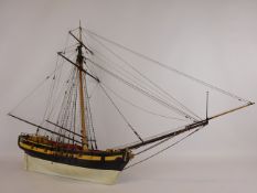 Wooden scale model of a single masted vessel, rigged without sail, W88cm, H64cm.