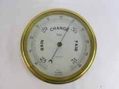 Brass bulkhead Sestrel Compensated aneroid Marine barometer 'IN Hg' millibars, on wooden plaque,