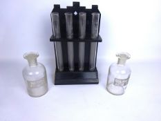 Early 20th century ebonised test tube rack stamped Thomas Bradford & Co.