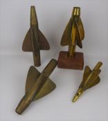 Four brass torpedo log spinners, one mounted on Teak from the fore/aft hatch from ship Durham,