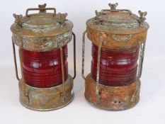 Pair of Copper circular Ships 'Not under Command' lamps with three nut covers, by N.M.V, H35cm (2).