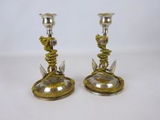Pair silver plated Maritime interest candlesticks formed as anchors entwined with brass chain &