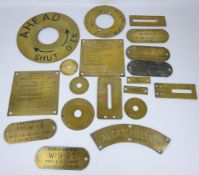 Collection of brass information plaques, including Ahead, Astern, Branch Breaker,