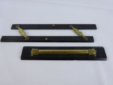 Early 20th century brass & ebony rolling rule and a similar parallel rule, L38cm max (2).