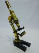 Early 20th century brass monocular microscope with rack & pinion adjust,