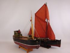 Part wooden model of a fishing boat, L66cm, & a Hanah boats model of a steam fishing boat,