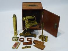 Brass monocular microscope by J H Steward, 406 Strand, London, on cast iron stand, No.