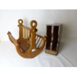 20th century teak magazine rack with anchor end supports,