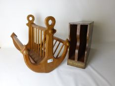 20th century teak magazine rack with anchor end supports,