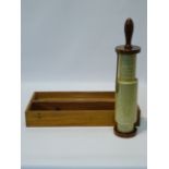 Fuller`s spiral slide rule calculator, with gilt brass marker and mahogany handle,