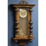 Early 20th century walnut Vienna style wall clock, hour striking on a coil,