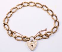 9ct gold curb chain bracelet with padlock hallmarked approx 20gm Condition Report