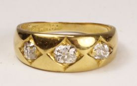 Early 20th century three stone diamond ring stamped 18ct Condition Report <a