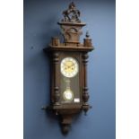 Late 19th century walnut Vienna style wall clock, with horse pediment,