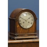 Early 20th century small oak cased clock, chiming the hours and halves on coil,